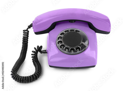 Old violet telephone with rotary dial isolated on white