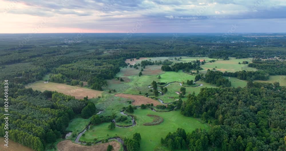 Drone aerial shot of natural meandering river Drone aerial shot of natural meandering river