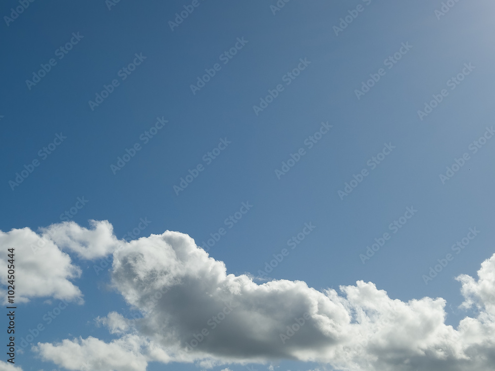 White clouds in summer sky background White clouds in summer sky background