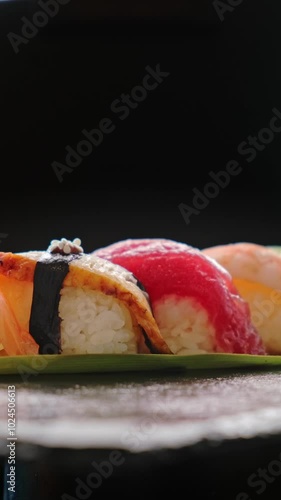 sushi on a plate closeup on a rotating table