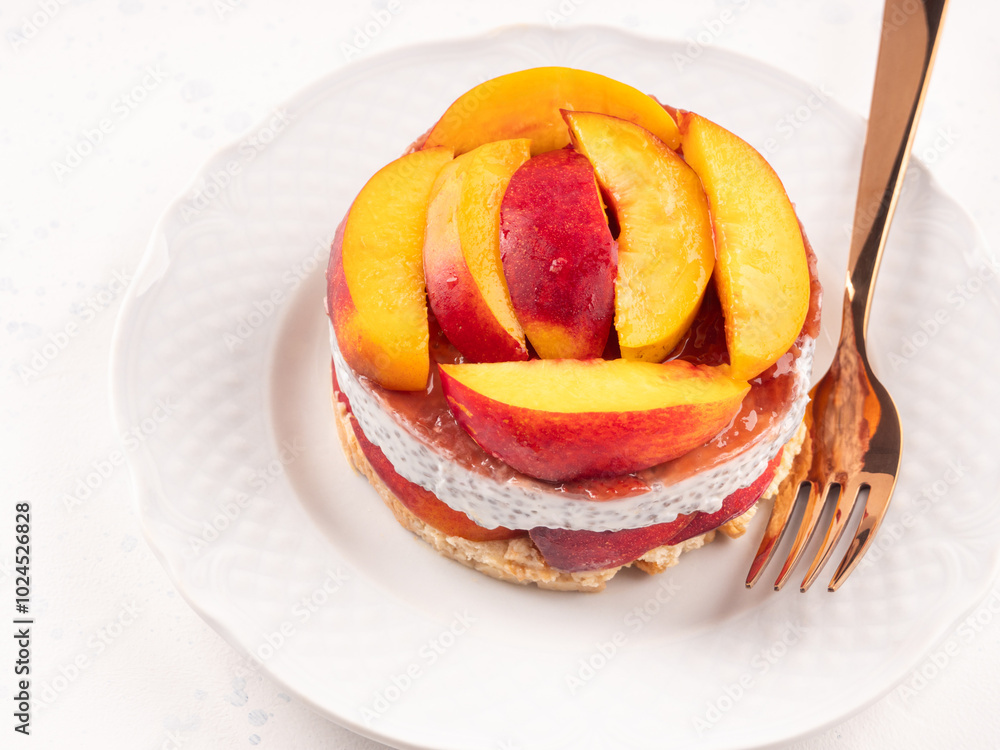 Overnight chia pudding dessert with greek yogurt, peaches and jam Overnight chia pudding dessert with greek yogurt, peaches and jam
