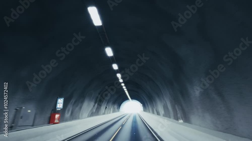 Car point of view driving in tunnel
