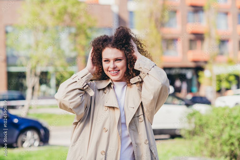 Photo of good mood adorable girl dressed stylish beige clothes enjoying spring sunny weather outdoors Photo of good mood adorable girl dressed stylish beige clothes enjoying spring sunny weather outdoors