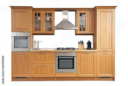 A full kitchen setup with natural wood cabinets, both overhead and lower cabinets, surrounding