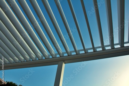 Pergola awning in the sunshine photo.