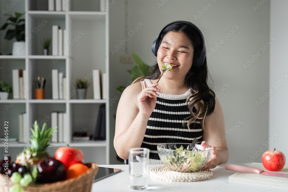 Young Woman Enjoying a Healthy Salad at Home for a Balanced Lifestyle and Wellbeing