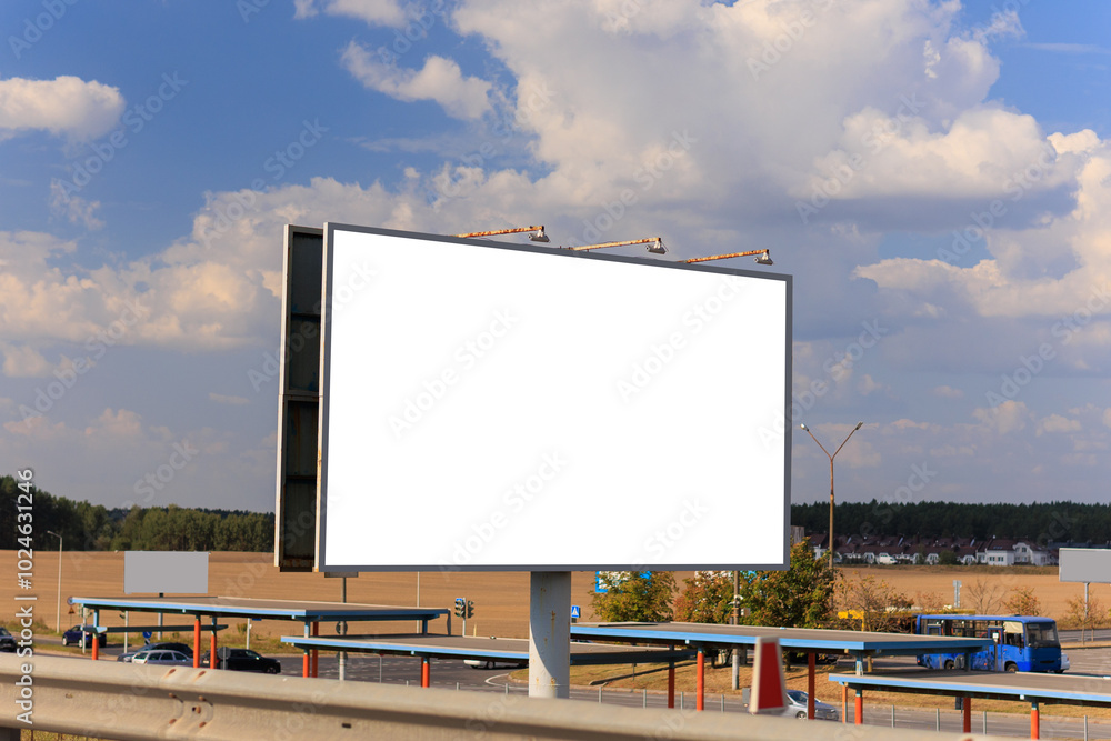 Background for design. Advertising billboard along the road in the city on a sunny day