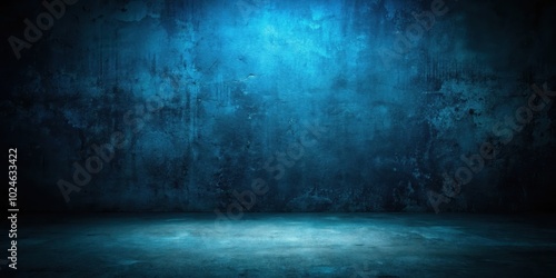 A Moody Blue Concrete Room With a Spot Light on the Floor