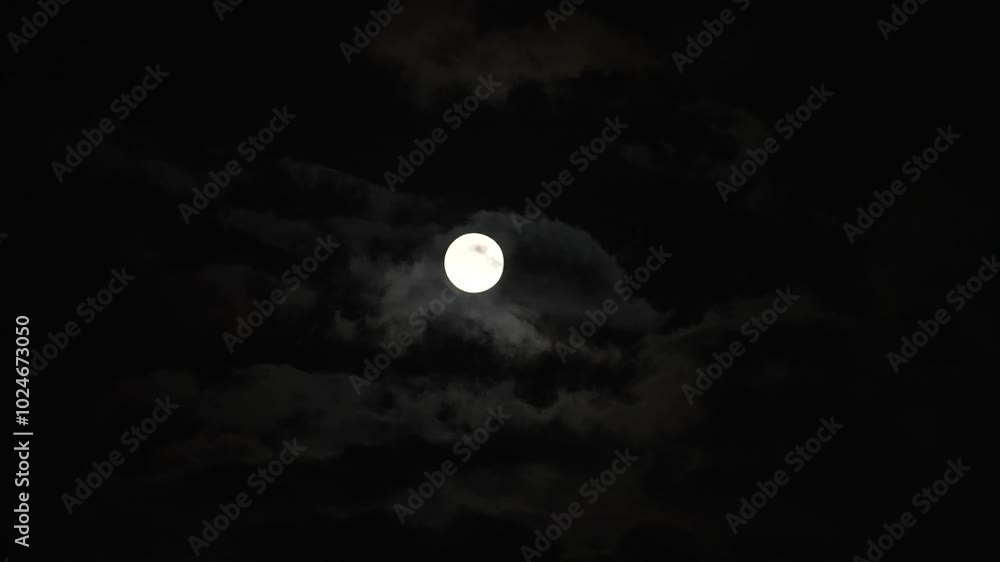 Clouds passing by moon at night. Full moon at night with cloud real time. mystery fairyland scene. Clouds passing by moon at night. Full moon at night with cloud real time. mystery fairyland scene.
