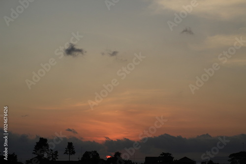 beautiful orange cloudy afternoon bright blue clouds, warm, sunset