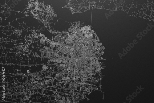 Quadro su tela Street map of Surabaya (Indonesia) on black paper with light coming from top