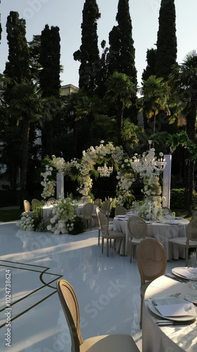 Drone flight video of luxury green white classical wedding decor on Italian historic villa Cortina Palace Sirmione 