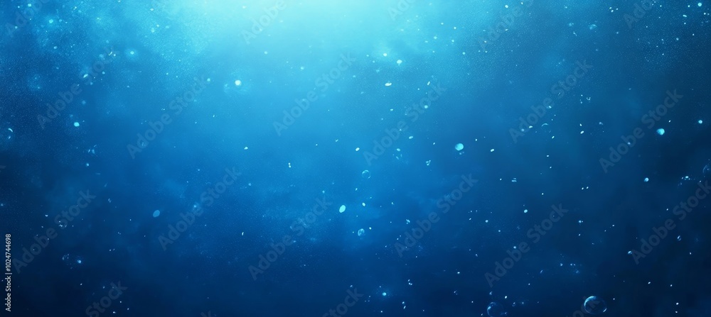 Fototapeta premium Abstract Underwater Background with Sunlight Rays, Bubbles, and Particles in Blue Tones