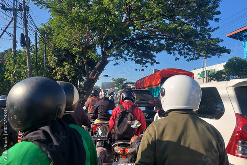 Congested Road Near Red Light Intersection photo