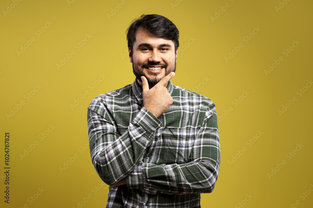 man smiling with hand on chin man smiling with hand on chin