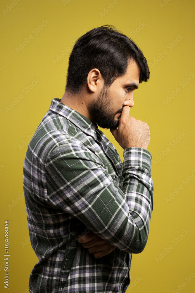 man in profile, with hand over mouth, thoughtful man in profile, with hand over mouth, thoughtful