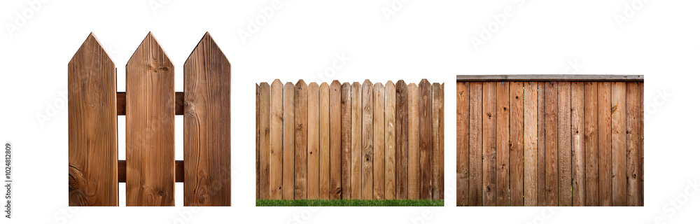 A wooden fence with pointed tops on white background. A wooden fence with pointed tops on white background.