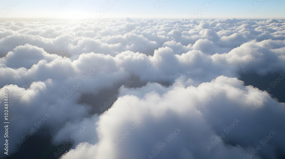 A panoramic view of fluffy white clouds in a clear blue sky, with the sun shining through. A panoramic view of fluffy white clouds in a clear blue sky, with the sun shining through.