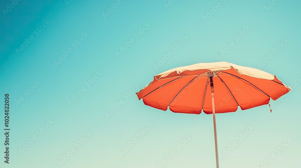 Close-up of a beach umbrella with a clear blue summer sky, leaving space for copy Close-up of a beach umbrella with a clear blue summer sky, leaving space for copy