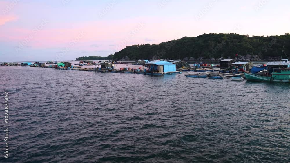 Sunset in the floating fishing village. An Thoi Port, Tropical Phu Quoc Island, Vietnam Sunset in the floating fishing village. An Thoi Port, Tropical Phu Quoc Island, Vietnam
