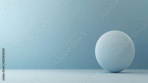 Geometric ball shape on minimalistic pastel color background with light and shadow play