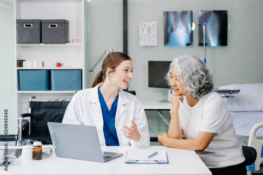 Obraz premium Portrait of female doctor explaining diagnosis to her patient. Doctor Meeting With Patient In Exam Room. A medical practitioner reassuring a patient .
