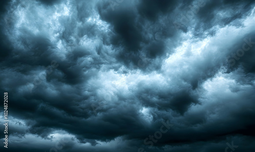 A dramatic, dark sky with heavy, brooding storm clouds.