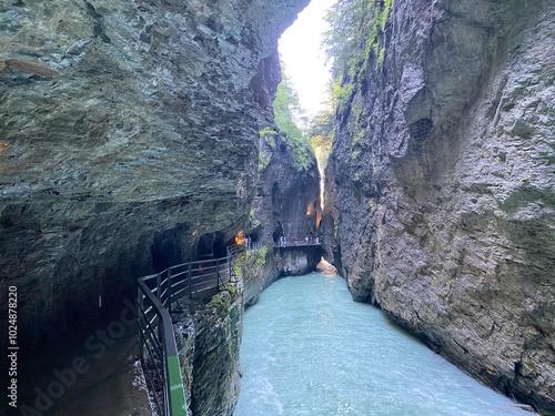 The Aare River Canyon or Aare Gorge in the Haslital Alpine Valley and in the Bernese Highlands - Meiringen, Switzerland (Aareschlucht im Haslital und im Berner Oberland - Schweiz) photo