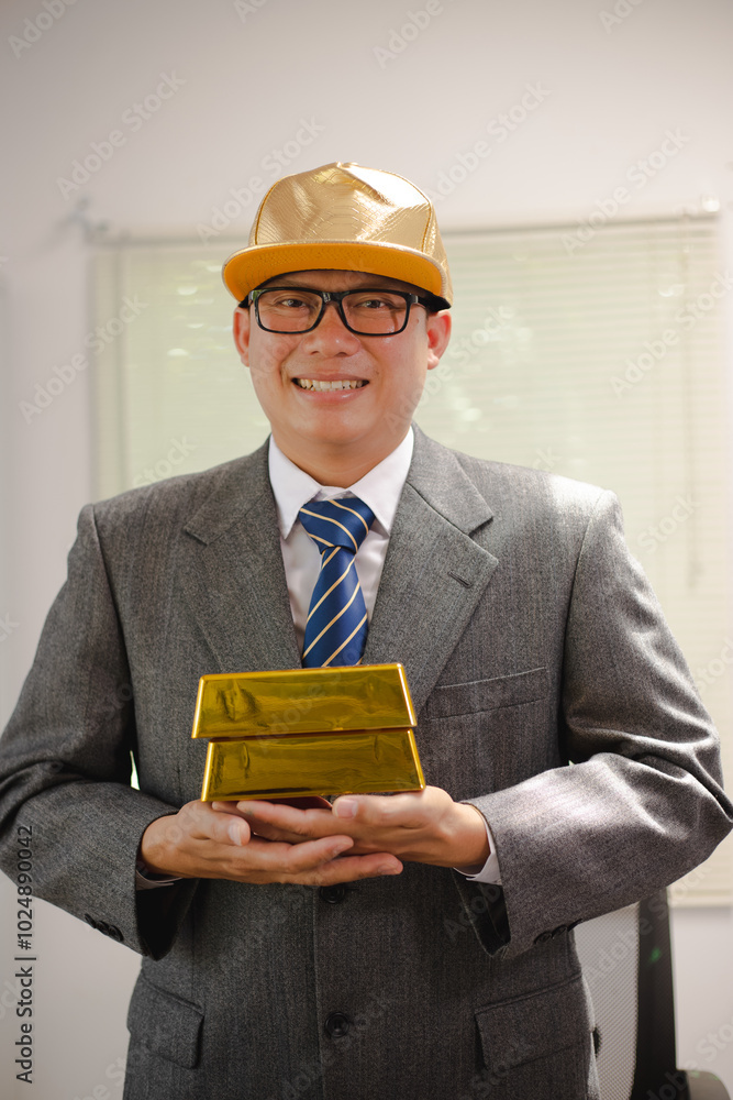 Businessman working hard with gold bars, assessing investments and transactions in finance office, wealth, asset allocation and precious metals trading strategies. Businessman working hard with gold bars, assessing investments and transactions in finance office, wealth, asset allocation and precious metals trading strategies.