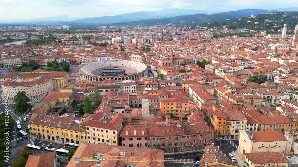 Italy, October 10, 2024: Panoramic aerial view of the beautiful city of love, Verona, in Veneto with its wonderful Arena and the Adige river Italy, October 10, 2024: Panoramic aerial view of the beautiful city of love, Verona, in Veneto with its wonderful Arena and the Adige river