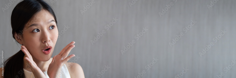 excited asian woman shouting wow with surprised facial expression, isolated background banner composition excited asian woman shouting wow with surprised facial expression, isolated background banner composition