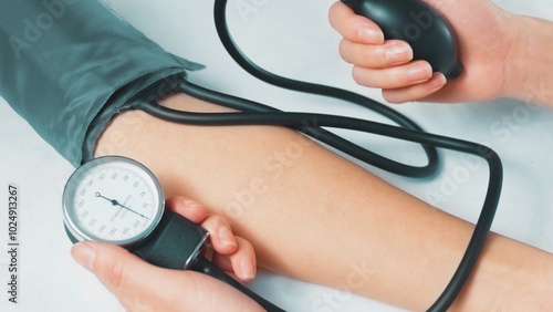 Blood pressure measuring on white background