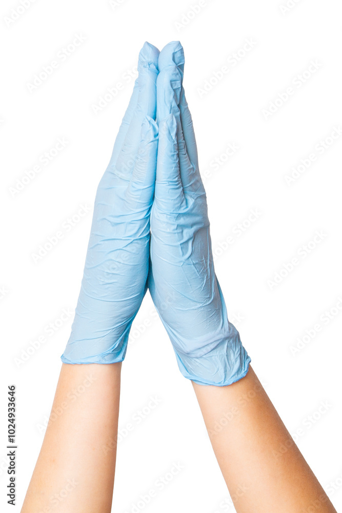 Hands in medical gloves folded in a prayer position on an empty background. Spirituality, mindfulness, healthcare themes. Hands in medical gloves folded in a prayer position on an empty background. Spirituality, mindfulness, healthcare themes.
