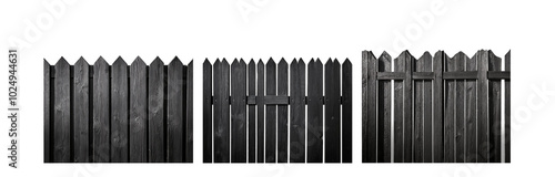 A black wooden fence with pointed tops against a white background.