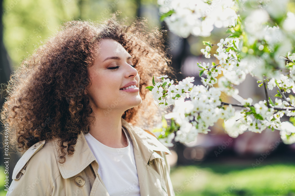Photo portrait of lovely adorable girl wearing stylish beige trench enjoy walk blooming garden background outdoors Photo portrait of lovely adorable girl wearing stylish beige trench enjoy walk blooming garden background outdoors