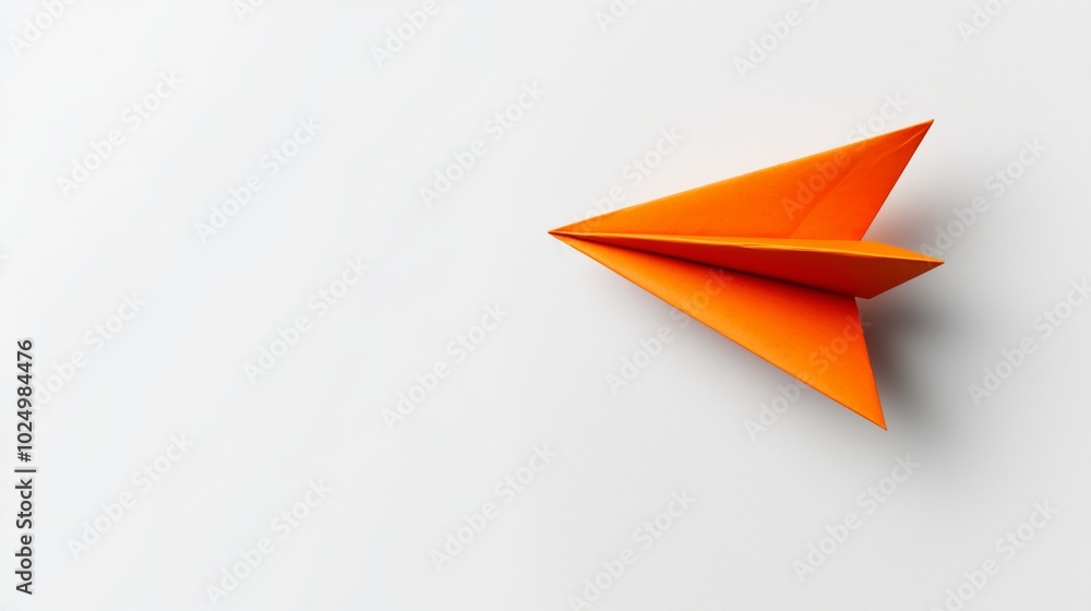 Orange Paper Airplane in White Space Orange Paper Airplane in White Space