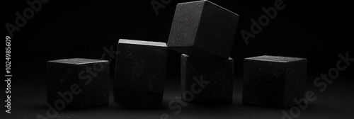 Black foam cubes, dark background