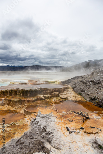 Breathtaking Landscape of Geothermal Hot Springs in Yellowstone National Park on a Cloudy Day in Wyoming, USA