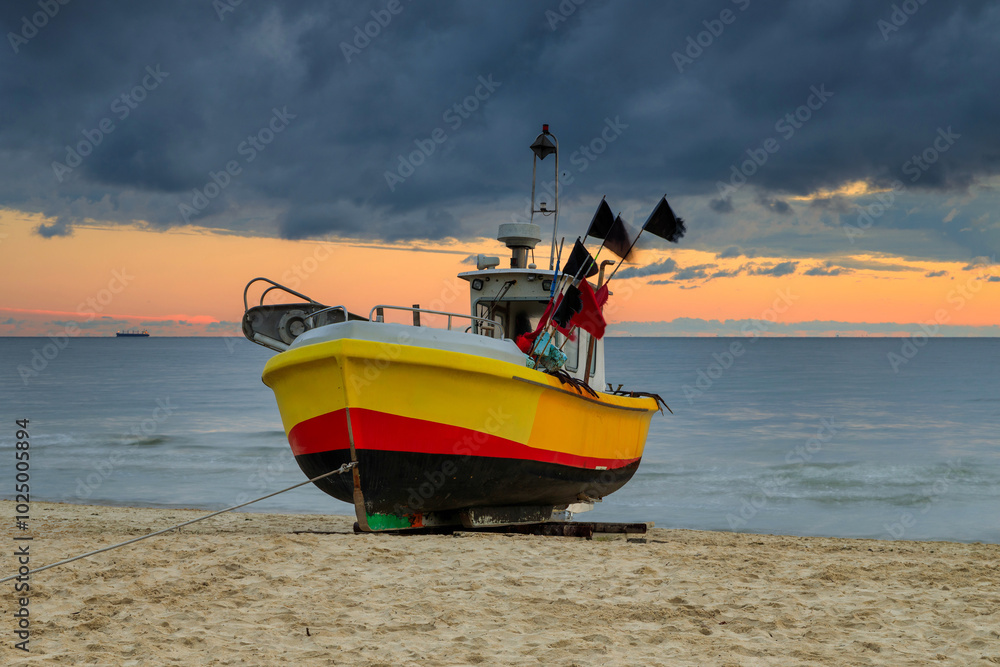 Beautiful sunrise on the beach of Baltic Sea in Sopot, Poland Beautiful sunrise on the beach of Baltic Sea in Sopot, Poland