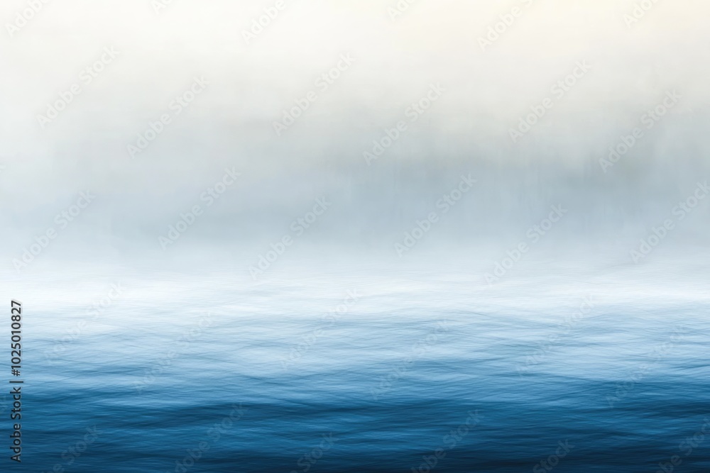 Fototapeta premium Foggy Morning Over a Tranquil Sea