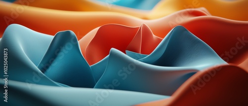 A vibrant drapery of colored fabric creating dynamic waves and textures, showcasing intricate patterns and a playful interplay of light.