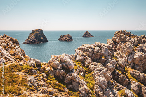 The rocks on Beg Pen Hir in the crozon peninsula at Camaret-sur-Mer, Bretagne, France photo