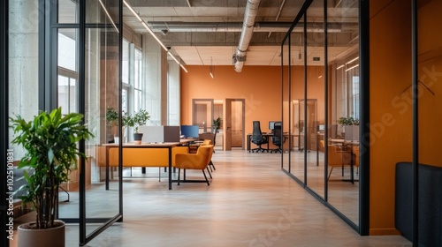 Modern Office Interior with Orange Walls and Glass Partitions