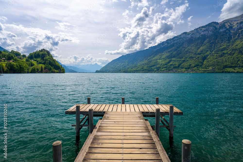 wooden pier on Brienz lake in Iseltwald in Switzerland