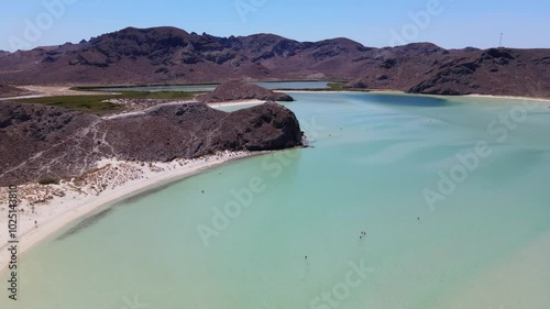 Wallpaper Mural Aerial drone footage of  a large bay with turquoise shallow water and desert landscape surrounding on a clear summer day Torontodigital.ca