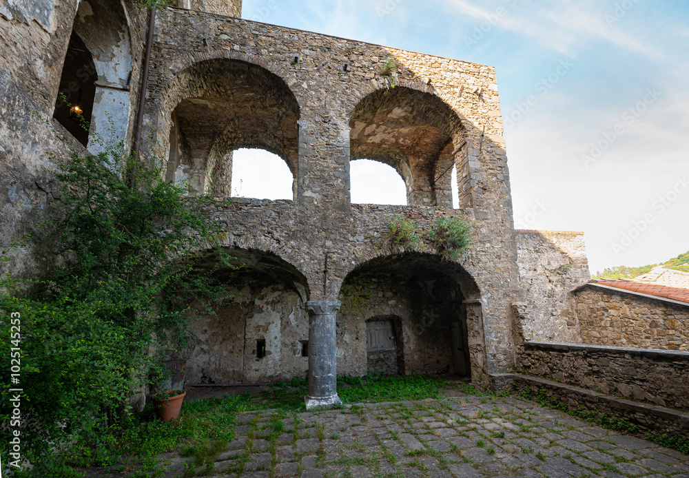 Courtyard of the medieval Malaspina castle in Fosdinovo, Tuscany, Italy Courtyard of the medieval Malaspina castle in Fosdinovo, Tuscany, Italy