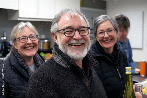 Group of elderly friends smiling together in a kitchen photo