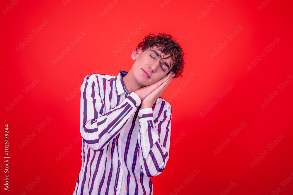 Young attractive guy and different emotions. Red background. Young attractive guy and different emotions. Red background.