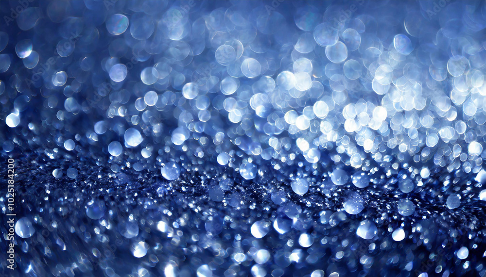Sparkling blue droplets on a reflective surface creating a mesmerizing bokeh effect in soft lighting during nighttime Sparkling blue droplets on a reflective surface creating a mesmerizing bokeh effect in soft lighting during nighttime