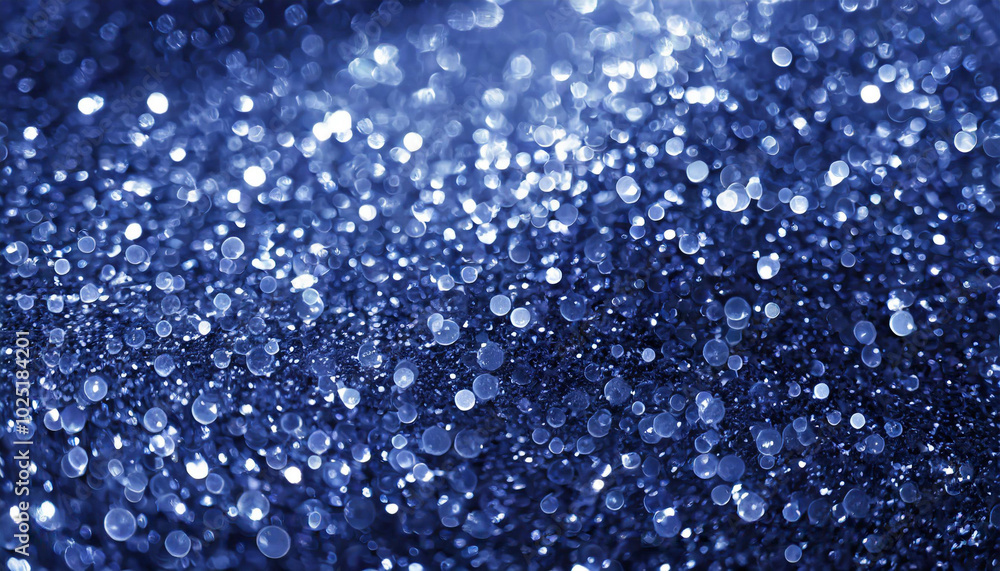 Sparkling blue glitter background with shimmering bokeh effects creating a vibrant, festive atmosphere perfect for celebrations